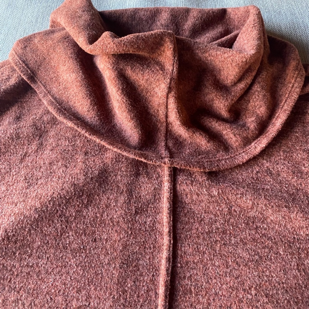 Fun cowl neck loose sweater, side slits and warm.